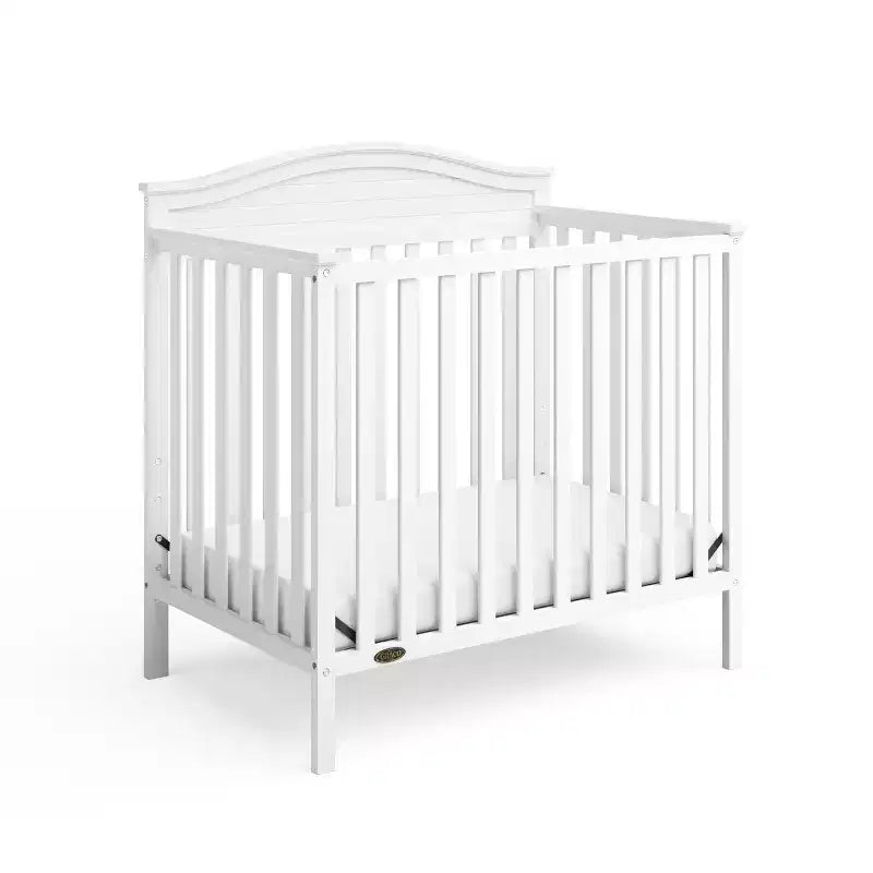 Mini-lit convertible 4-en-1 Graco Stella avec matelas