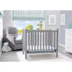 Mini-berceau Delta Children Sprout avec hauteur réglable et matelas