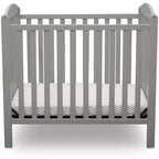 Mini-berceau Delta Children Sprout avec hauteur réglable et matelas