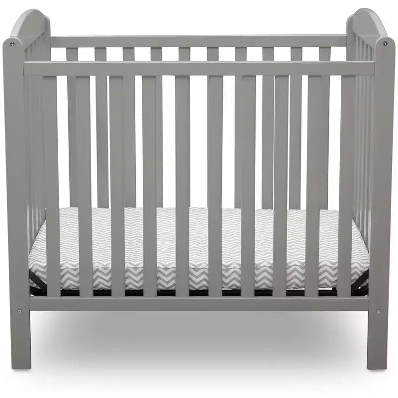 Mini-berceau Delta Children Sprout avec hauteur réglable et matelas