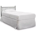Mini-berceau Delta Children Sprout avec hauteur réglable et matelas