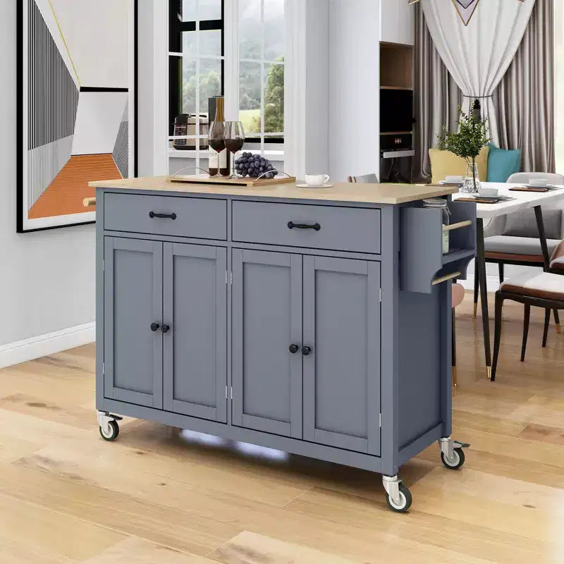 Îlot de cuisine moderne Okak avec abattant et étagères réglables, chariot de cuisine roulant avec roues et tiroirs, table à manger pliante avec armoire de rangement