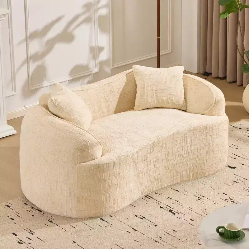 Canapé beige courbé 2 places avec accoudoirs et 2 coussins – Petit format, idéal pour toutes les pièces