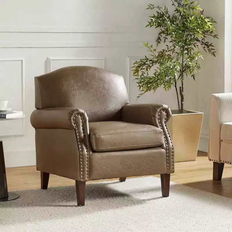 Fauteuil transitoire Gianluigi en cuir vegan avec garniture cloutée pour chambre et salon | ART OF LIVING DESIGNS
